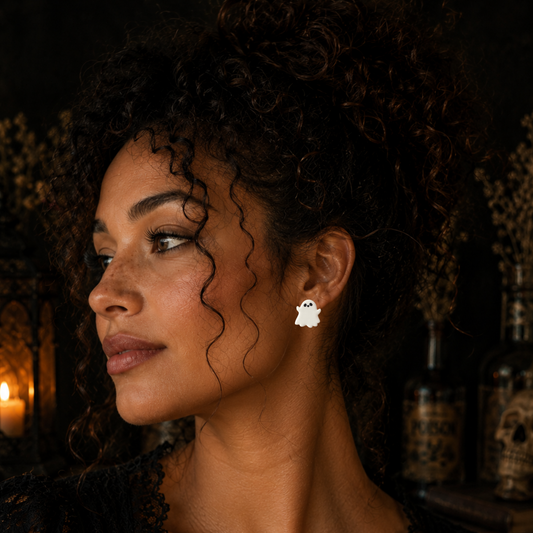 Model wearing cute Halloween ghost stud from Palmetto Clay Jewelry.